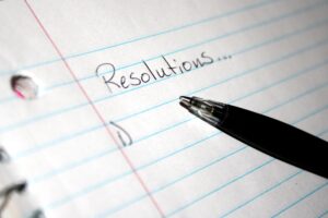 Resolutions... written in black pen on notebook paper